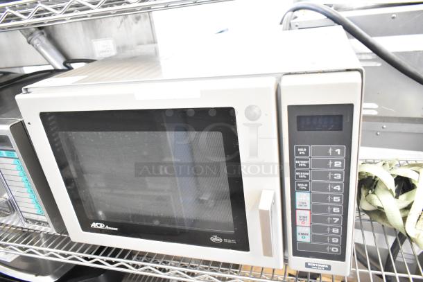 Amana RCS10MPA commercial countertop microwave oven, 120 volts, keypad controls, stainless steel, used condition.