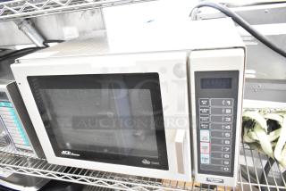 Amana RCS10MPA commercial countertop microwave oven, 120 volts, keypad controls, stainless steel, used condition.