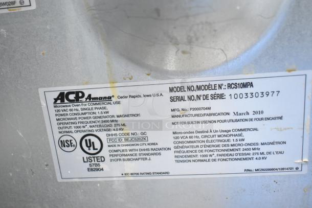 Amana RCS10MPA commercial microwave, 120V, with visible model and serial number label, made March 2010.