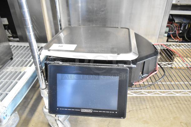 2017 Hobart HTi-7LH26 metal commercial food portioning scale. Tested and working. Includes digital display and label "58".