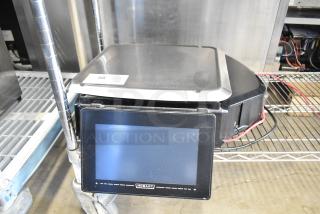 2017 Hobart HTi-7LH26 metal commercial food portioning scale. Tested and working. Includes digital display and label "58".