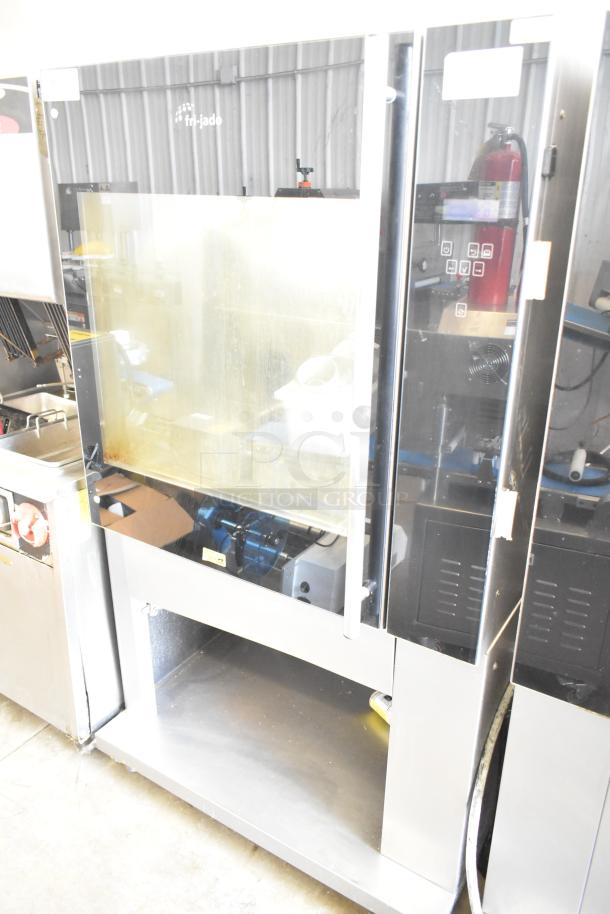 Fri-jado commercial floor-style electric rotisserie oven on casters, 208 volts, 3 phase, with glass door and control panel.