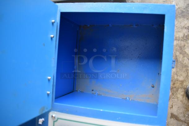 Commercial paper tube labeling machine, blue metal casing, 208/250 volts, 1 phase, used condition, open compartment view.