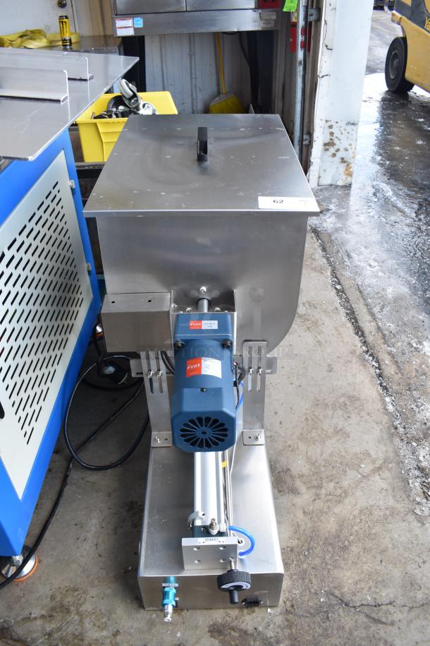 G1WG Countertop Quantitative Filling Machine, model G1WG, 100 volts, in good condition. Visible controls and labels.