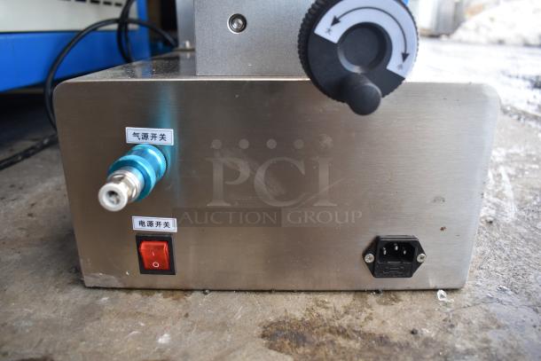 G1WG Countertop Quantitative Filling Machine, 100 Volts, 1 Phase, stainless steel, function labels in Chinese, power switch visible.