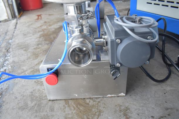 G1WG countertop quantitative filling machine, 100 volts, 1 phase. Stainless steel construction, visible control switch and wiring.