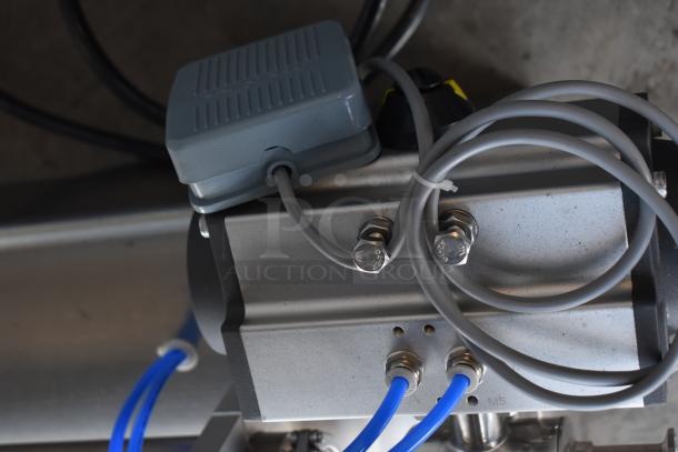 G1WG Countertop Quantitative Filling Machine, 100V, 1 Phase, shown with attached cables and connectors.