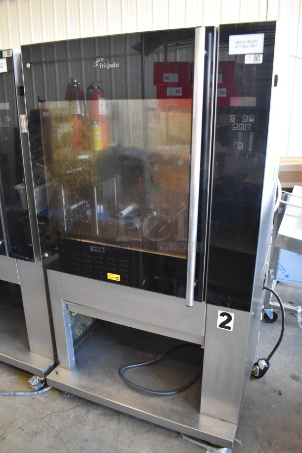 Fri-jado TDR7-P rotisserie oven on casters, electric, 208 volts, 3-phase, commercial floor style, good condition.