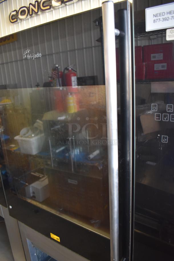 Fri-jado TDR7-P commercial rotisserie oven with glass door, stainless steel handle, and visible brand logo. 208V, 3-phase, on casters.