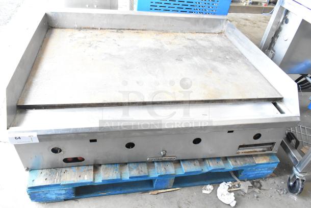 Southbend commercial countertop gas griddle, flat top, showing signs of wear, placed on a wooden pallet.