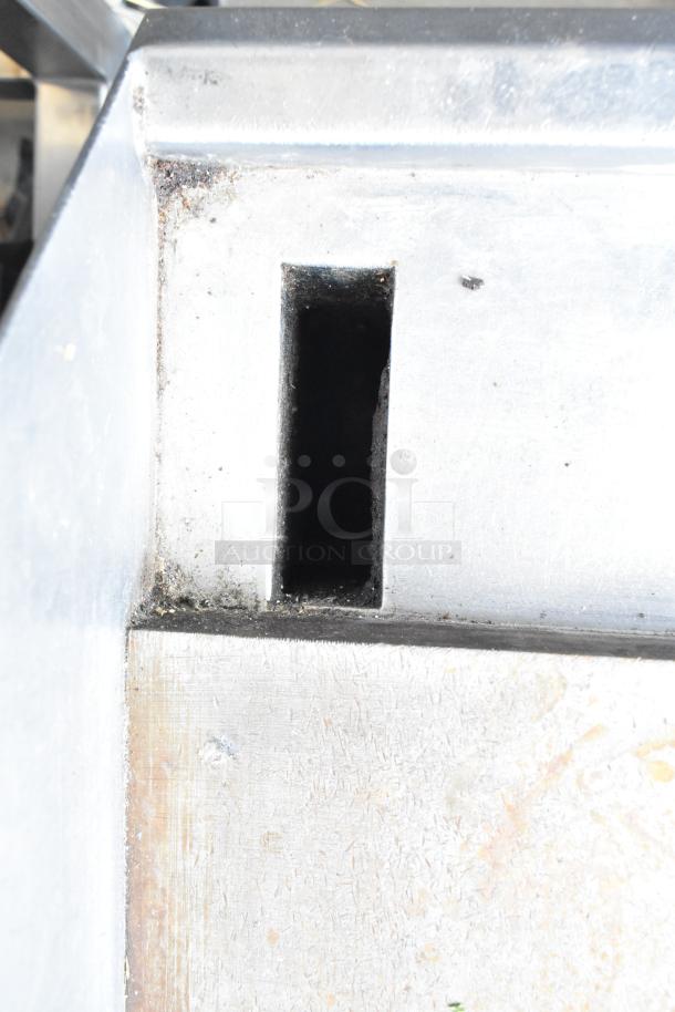 Southbend commercial gas griddle vent detail, showing wear and surface marks, indicating usage but functional condition.