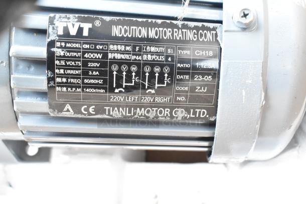 TVT induction motor, 400W, 220V, 3.8A, 50/60Hz, 1400 RPM, model CH18, by Tianli Motor Co. Ltd., with rating label.