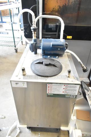 Frontline commercial fryer oil transport on casters with motor, hoses, and safety labels; durable and easy mobility.