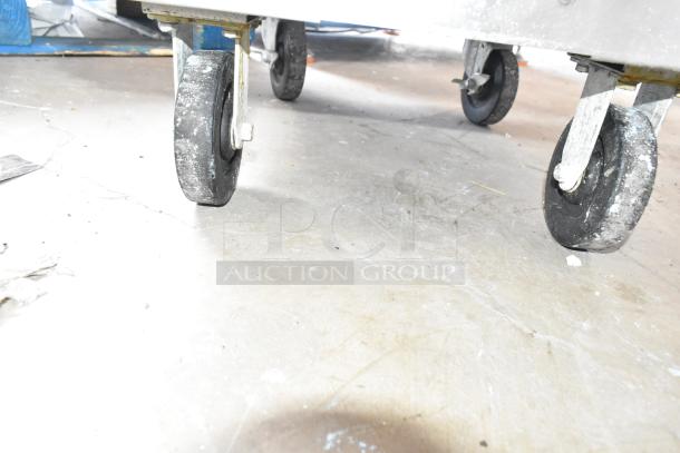 Frontline Commercial Fryer Oil Transport on casters, in used condition, showing wheels for mobility and easy transport.