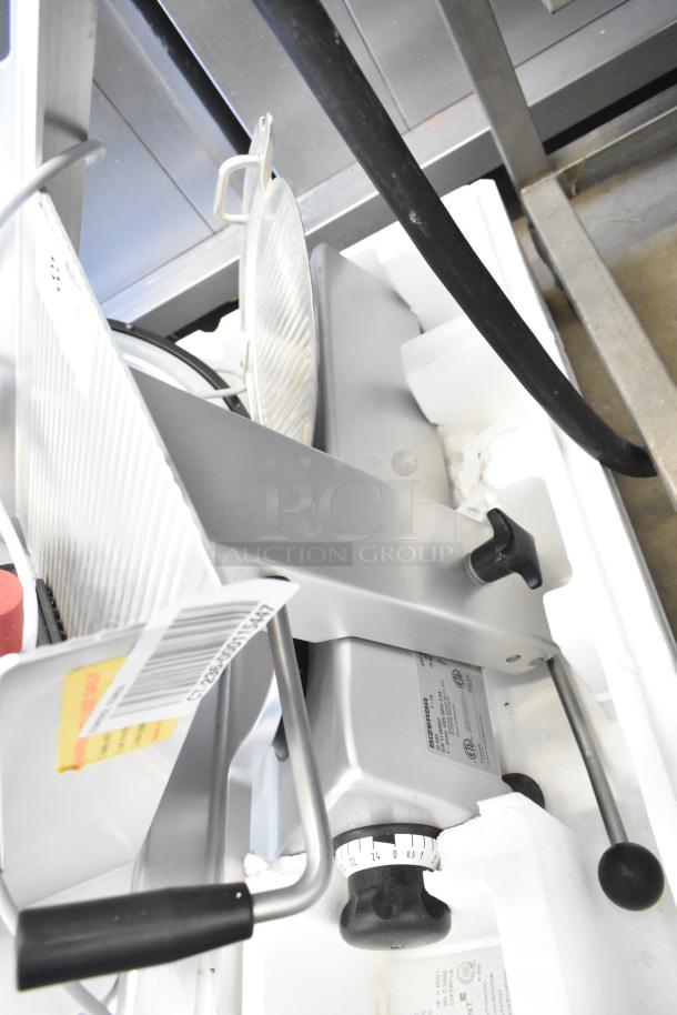 Bizerba GSP H meat slicer, commercial countertop model, 120 volts, 1 phase, in working condition with adjustable settings.