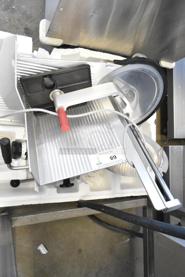 Bizerba GSP H commercial meat slicer, 120V, 1 Phase, featuring sharp blade and durable metal construction, in good condition.