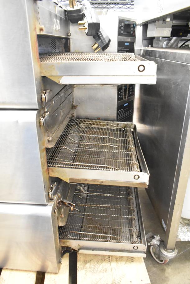 3 Turbochef HhC2020 ovens, electric conveyor style, 208/240V, 3 phase, used. Visible wear, stainless steel finish.