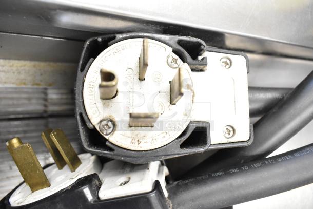 Plug of Turbochef HhC2020 commercial conveyor oven, 208/240V, 3-phase. Visible markings show electrical specifications.