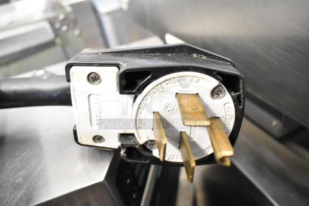 Turbochef HhC2020 commercial electric conveyor oven plug, showing 208/240V, 3-phase connection, sturdy condition.