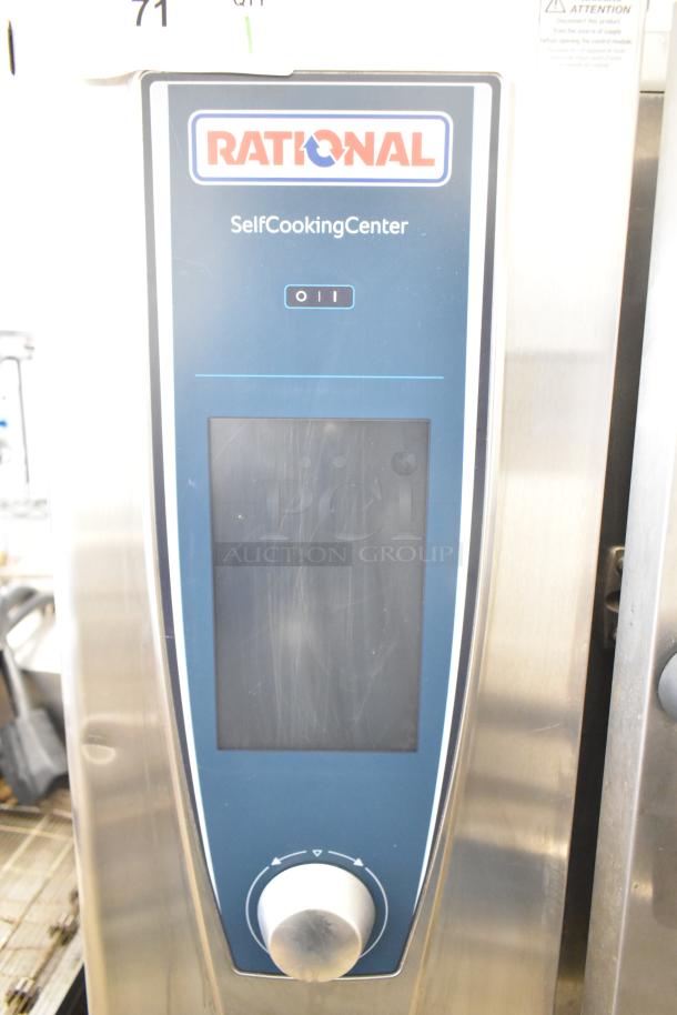 2019 Rational SCC WE 62 Self Cooking Center Combi Oven. Stainless steel, touchscreen, on double pan rack stand. 480 Volts, 3 Phase.