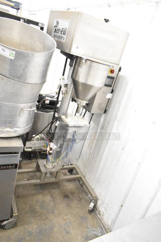 Per-fil Micro-15 commercial filler machine on casters, 125V, 1 phase. Stainless steel construction, used condition.
