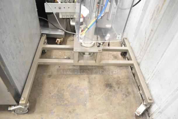 Per-fil Micro-15 floor filler machine on casters, 125V, 1 phase. Features robust construction, suitable for commercial use.