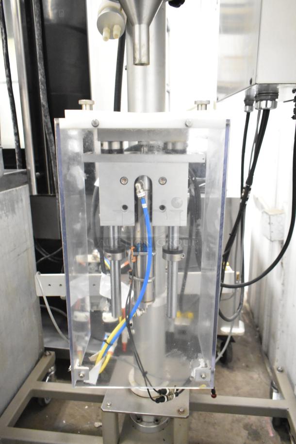 Per-fil Micro-15 floor filler machine on casters, 125V, 1 phase, features visible wiring and connectors in transparent casing.