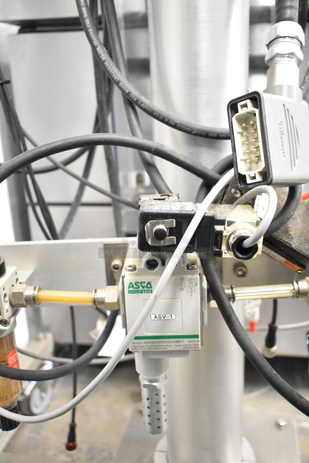 Per-fil Micro-15 floor filler machine on casters, 125 volts, 1 phase. Features ASCO Numatics controls, multiple wiring connections.