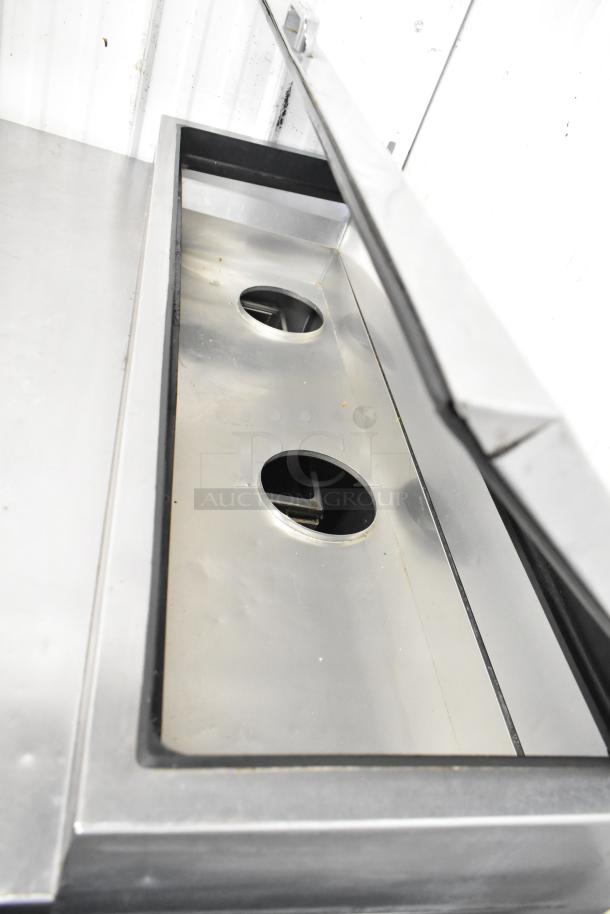 2017 True TPP-44D-2 commercial pizza prep table, stainless steel, with two drawers, and commercial casters.