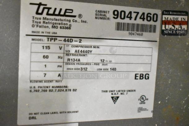 2017 True TPP-44D-2 commercial pizza prep table with 2 drawers, on casters. 115V, 1 Phase, model details on label.