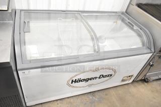 XS-500YX ice cream freezer merchandiser, Haagen-Dazs branding, sliding glass top, 115V, commercial, used condition.