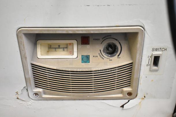 XS-500YX Commercial Ice Cream Freezer control panel, showing temperature gauge, power indicators, and switch. Some wear visible.