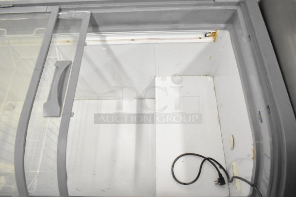 XS-500YX Commercial Ice Cream Freezer Merchandiser, open top, glass lid, visible power cord, 115V, good condition.