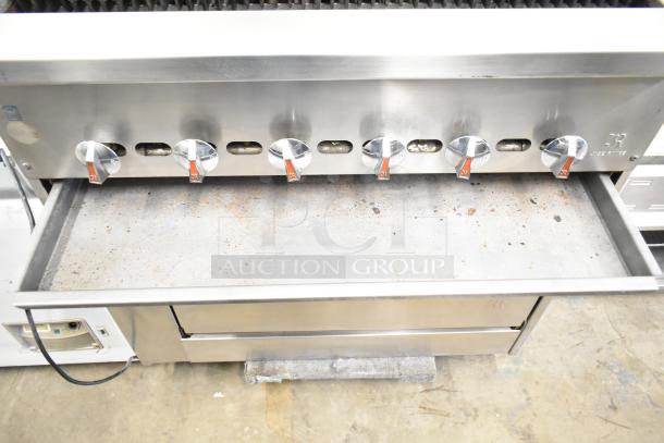 Jade Range JSR-36B-36 commercial charbroiler in stainless steel, featuring control knobs, oven, and back splash. Used condition.