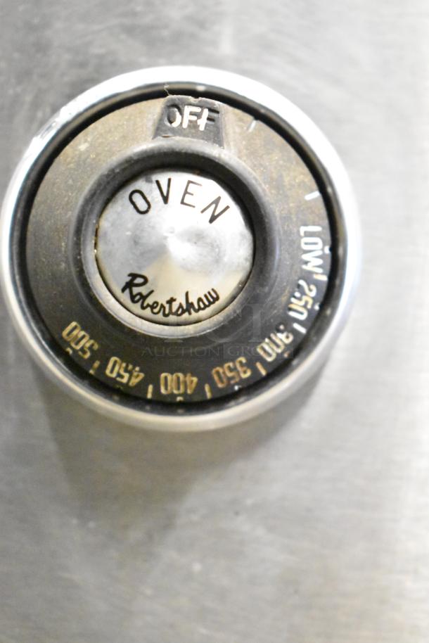 Oven control knob of Jade Range JSR-36B-36, featuring Robertshaw branding, temperature markings, and "Off" label.