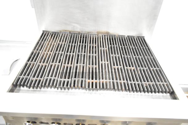 Jade Range JSR-36B-36 commercial charbroiler range, natural gas, features oven and back splash. Stainless steel, clean condition.