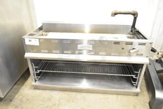 Cookline Commercial Gas Powered Cheese Melter, stainless steel, adjustable rack, used condition, model label visible.