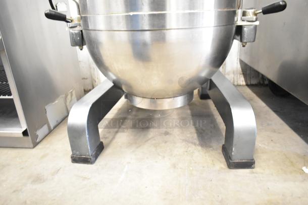 Avantco MX40 commercial dough mixer base with stainless steel mixing bowl. Far view showing sturdy metal legs.