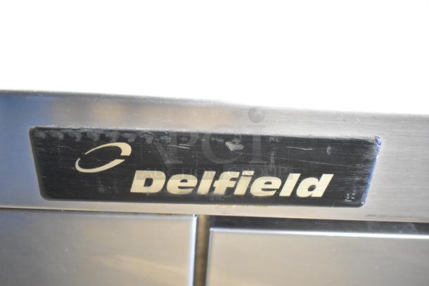 Delfield Commercial 2 Drawer Chef Base on casters, stainless steel, 115V, 1 phase, features Delfield logo plaque.