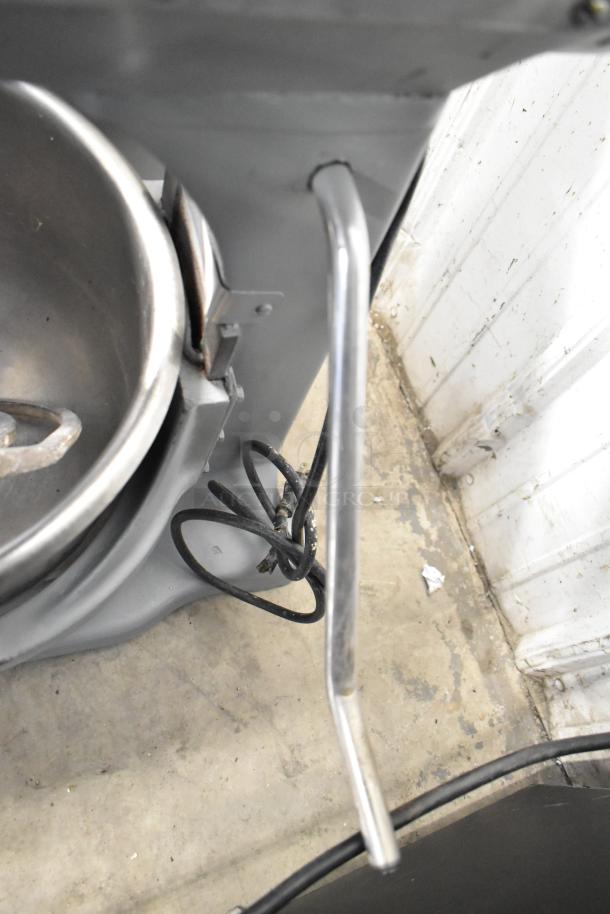 Hobart commercial dough mixer with mixing bowl and paddle attachment, 115V, 1 phase. Visible cords and metal handle.