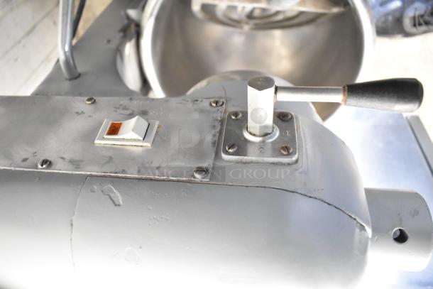 Hobart commercial countertop planetary dough mixer with mixing bowl and paddle attachment, 115 volts, 1 phase, gray, used.