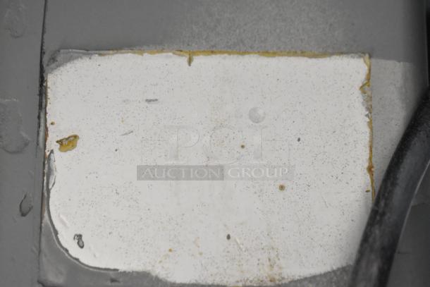 Hobart Commercial Countertop Planetary Dough Mixer, 115V, includes mixing bowl and paddle attachment. Visible wear on label.