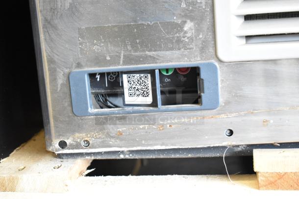 2018 Scotsman F1222A-32E ice machine with visible QR code and controls, in used condition; produces 1100 lb/day.