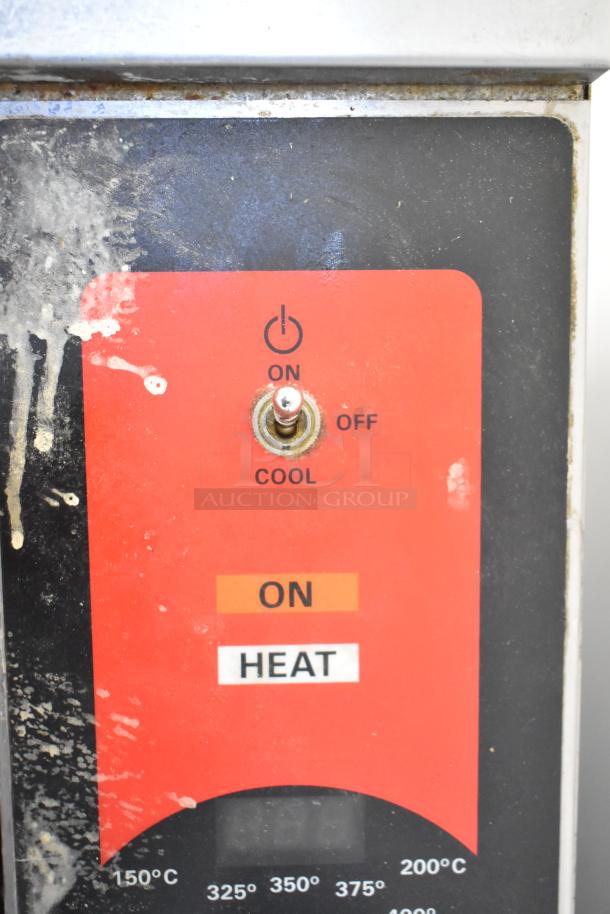 Red control panel of Vulcan commercial convection oven, showing ON/OFF toggle, temperature settings, and used condition.