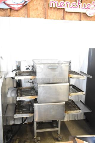 Turbochef HhC2020 electric conveyor ovens on stand with casters. 208/240V, 3-phase. Includes 3 units, used condition.