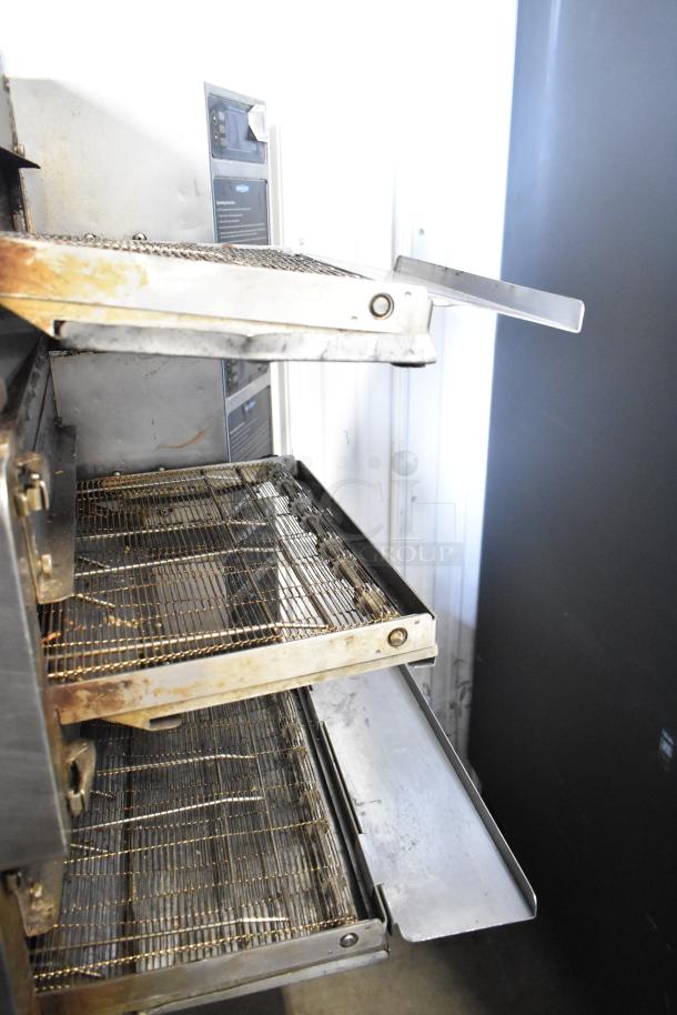 Turbochef HhC2020 electric conveyor oven on stand with casters, used, 208/240V, 3-phase, features dual racks.