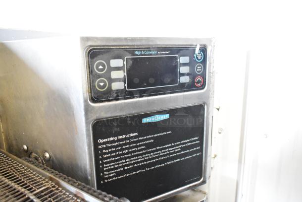 Turbochef HhC2020 commercial electric conveyor oven on stand with casters, 208/240V, 3 phase, shown with control panel.
