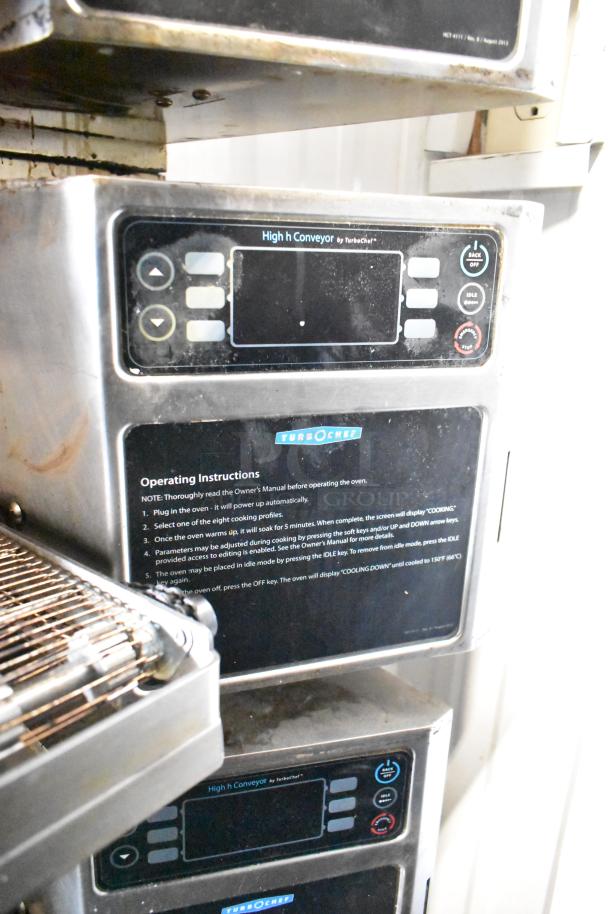 Turbochef HhC2020 electric conveyor rapid cook oven on stand, with digital control panel and operating instructions visible.