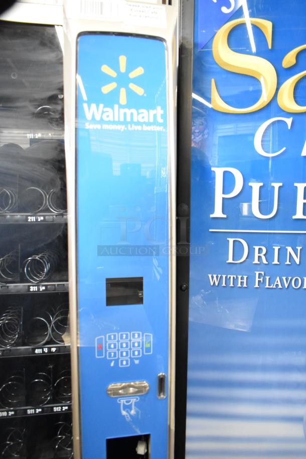 Crane 187D commercial floor vending machine, 115 volts, 1 phase, with keypad and product slots. Slight wear visible.