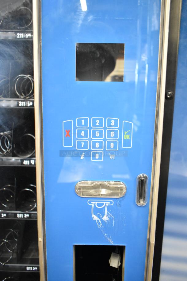 Crane 187D vending machine, commercial floor style, keypad visible, 115 volts, 1 phase, used condition.